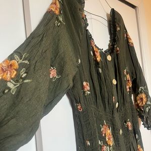 Dark green smocked floral embroidered maxi dress.